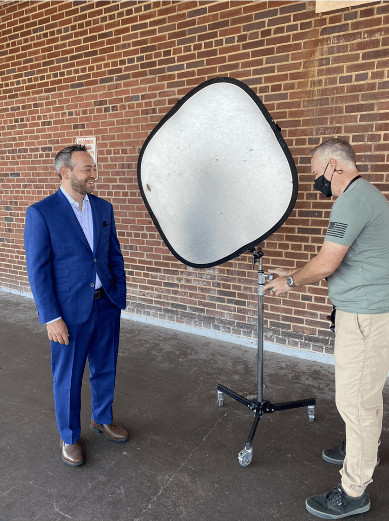 A man and a cameraman during a photoshoot